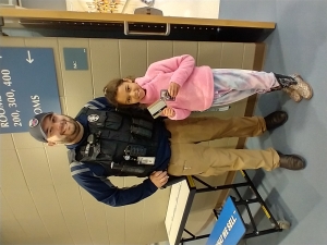Brielle Watson, a third grader from Prairie Ridge Intermediate School, collected all the Cop Cards and received a gift card from Officer Pugh of the Reedsburg Police Department. (Submitted photo)