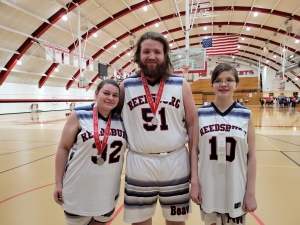 On Saturday March 19, three Reedsburg Special Olympic athletes competed at the northern Wisconsin basketball skills tournament at Neenah High School. Travis Daniels and Kaylee Clark both earned second-place finishes in their divisions, and Annie Zekas earned a fourth-place finish. From left are Kaylee Clark, Travis Daniels and Annie Zekas. (Submitted photo)