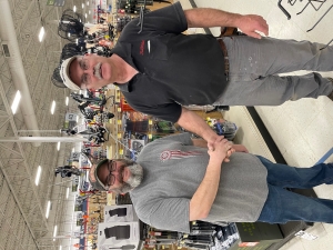 Rob McConnell of Reedsburg True Value presents nine boxes of archery equipment to Reedsburg Outdoor Club Board Member Corey Lynch. The items will be used at the Reedsburg Outdoor Club. (Submitted photo)