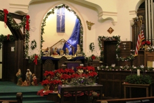 First Presbyterian Church was full of poinsettias, angels and sparkling décor during Living Windows. (Photos by Heather Stanek)
