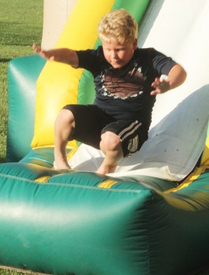 Kids enjoy the fun of the bouncy houses as part of the Cazenovia Celebration this past weekend. The Cazenovia Celebration featured baseball games, a parade, a run/walk and vendors. (Photos by Troy Matz)