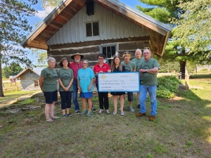 The W.R. & Floy A. Sauey Family Foundation has presented a $23,500 donation to the Reedsburg Area Historical Society. Representatives gathered Aug. 12 for the presentation. Funds were raised during a June 3 golf outing. The donation will go toward the development and preservation of structures at the historic site, which is located at 7882 Highway 23. The Foundation supports nonprofits in communities where Nordic Group of Companies members operate. These include Flambeau, Seats and Columbia Vehicle Group. F