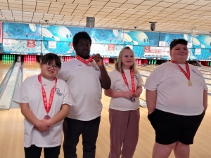 On Saturday, Dec. 7, five Special Olympic athletes from the Reedsburg area competed at the state Special Olympic bowling tournament in Wausau.  All five earned medals in their respective divisions by finishing in the top three. Ella Bernacchi (earned a third-place bronze medal), Isaiah Blair (earned a second-place silver medal), Kate Thomas (earned a second-place silver medal), and Sadik White (earned a gold medal with a first-place finish).  (Submitted photos)