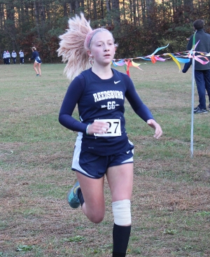 Sophomore Abby Voigt crosses the finish line strong for the Reedsburg Beaver girls cross country team at Thursday’s Badger North Culmination Meet at the Hartje Center. Baraboo, Sauk-Prairie, Portage and Beaver Dam joined Reedsburg in the five-team event that wraps up the regular season. (Photo by Troy Matz)